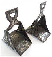 A PAIR OF MORROCAN STIRRUPS FOR A CHILD