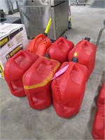 6- 5gal red plastic fuel cans