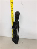 African wood carved man with pipe