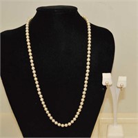 26" strand of freshwater pearls and earrings