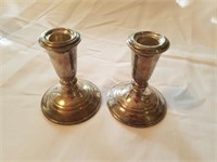 Sterling candlesticks. Crown. weighted