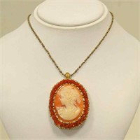 Carved cameo pendant by Carada