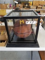 MU Basketball in glass case (ball is flat)