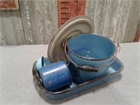Blue enamel items--pans, bucket, ladle, etc