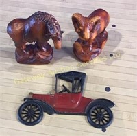 Wooden Statues and Cast Iron Hanging Car