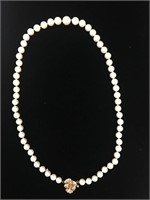 Strand of  Cultured Pearls w/ 14k yellow Clasp
