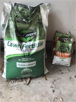 2 Bags lawn fertilizer and 2 Grass Seed