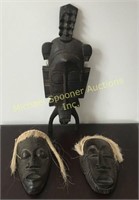 THREE AFRICAN CARVED WOOD WALL MASKS