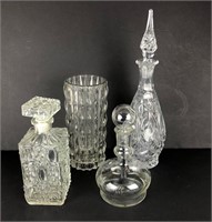 Three Decanters and a Vase