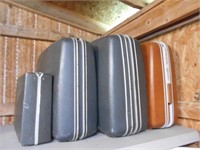 4 Hard Suitcases