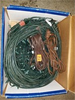 EXT. CORDS, CHRISTMAS LIGHTS, BLOW UP TURKEY