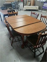 Kitchen tables w/3 leaves and 5 chairs