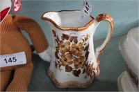 CASH FAMILY HAND PAINTED PITCHER