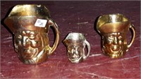 Trio of copper  Toby jugs 1 inch 2 inch and 3