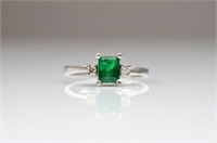 White gold and emerald ring