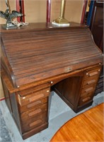 Early 20thC oak roll top desk,