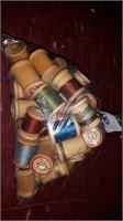 Bag of wooden spools