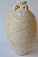Large cream cizhou style ovoid shaped jar