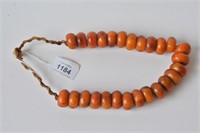 Strand of Tibetan amber beaded necklace,