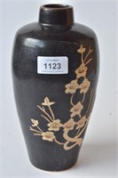 Black glazed vase with slip decorations of prunus