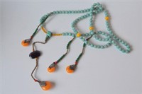 Green stone beaded cord necklace with
