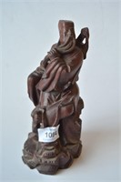 Carved wooden figure of a bearded