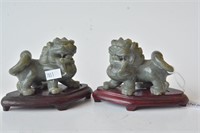 Pair of carved green jade Foo lions,