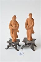 Pair of carved boxwood figures of a man and woman
