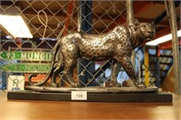 Silver painted resin sculpture of a prowling