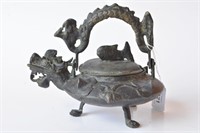 Bronze covered tripod teapot