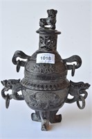 Black stone covered tripod censer