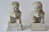 Pair of white parian ware porcelain Foo lions,