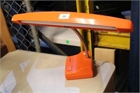 Hanimex orange coloured fluro desk lamp,