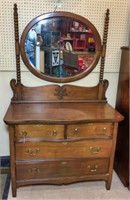 Antique 4 Drawer Dresser with Swiveling