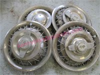 4 old chevy chevrolet hubcaps (1 damaged)