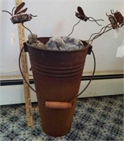 Very Interesting Bucket Full of Garden Art
