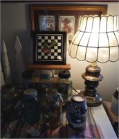 Jars, Lamp, Stand, Prints, All on Table