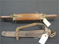 MANUFACTURER: Leather Sheath and Wood Handled Carv