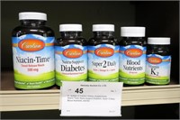 5 - bottles of Carlson Dietary Supplements;