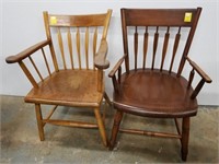 Two wooden arm chairs