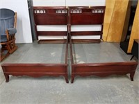 Two mahogany twin beds