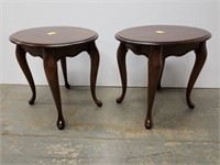 Two oval cherry end tables