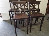 Five mahogany finish counter height chairs