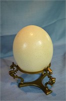 Ostrich egg on brass oriental stand