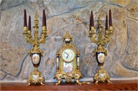 Antique gold & porcelain clock & 2 candleabras