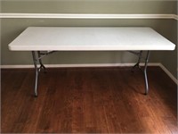 Folding Table. 72in w x 30in d x 30in h