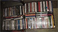 Two boxes of CDs including Mariah Carey,