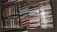 Two boxes of CDs including Paula Abdul