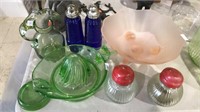Group of depression glass including a green glass