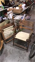 Pair of vintage folding chairs with canvas seats,